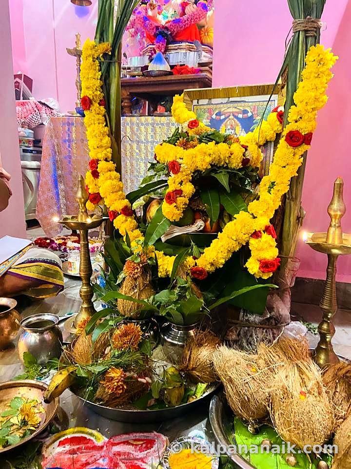 Marigold garlands on a puja stand