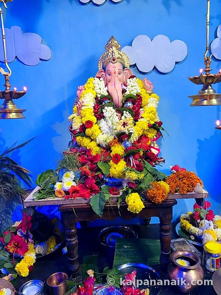 Ganesh altar heaped with flowers