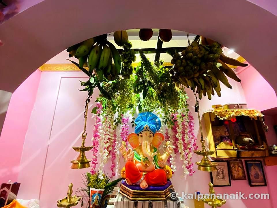 Ganesh idol under banana leaves