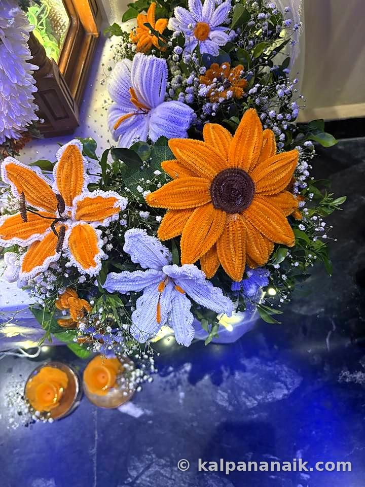 Sunflower and orchid arrangement
