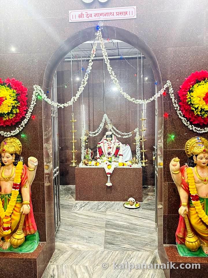 Silver shrine with garlands