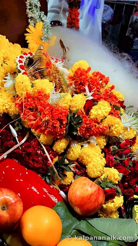 Marigold and rose offerings